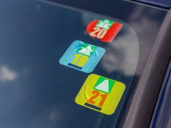 Three Swiss Road Tax Stickers Vignette at Car Windshield